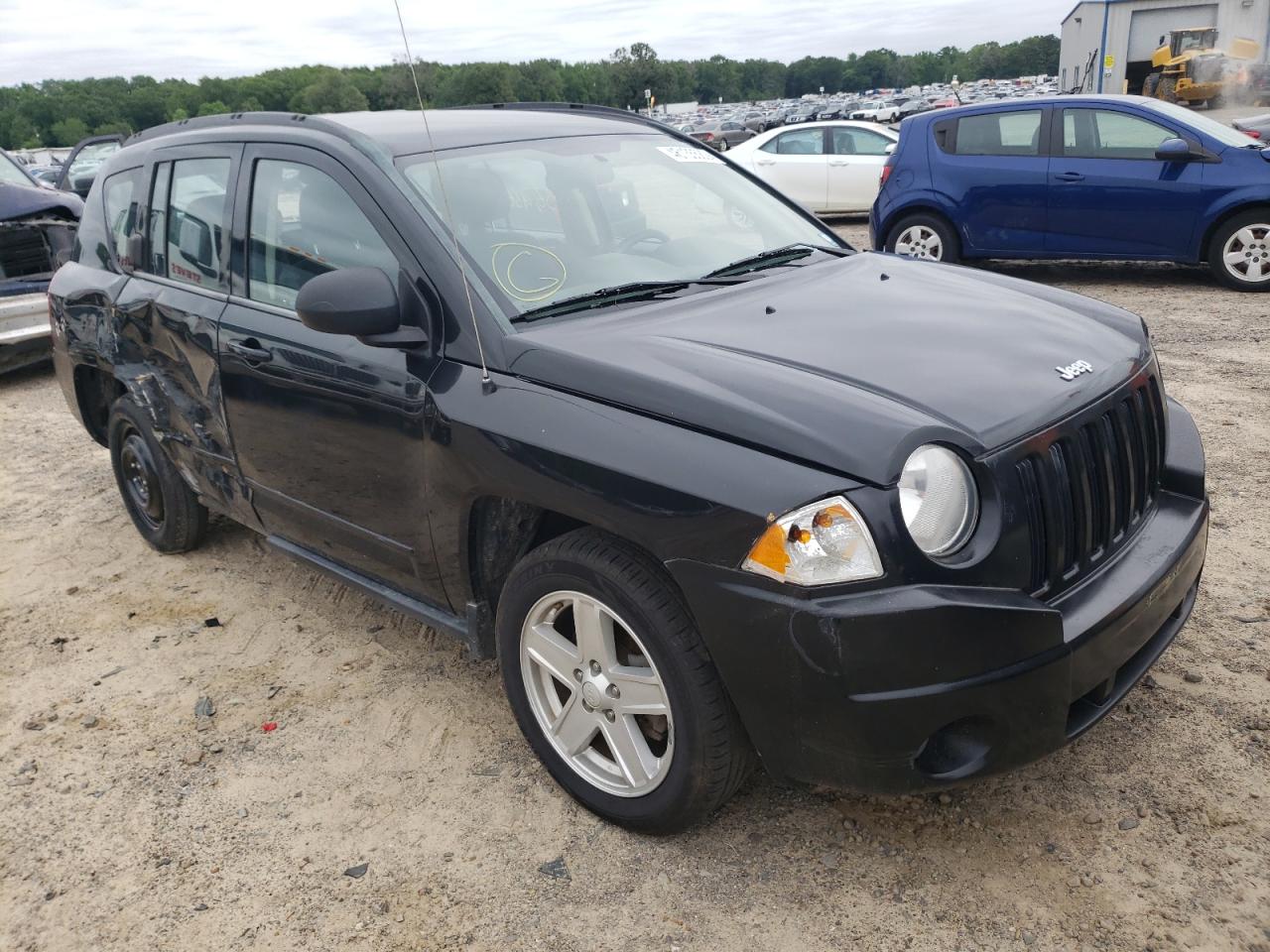 JEEP COMPASS SP 2010 with VIN 1J4NT4FB4AD585330 - Photo from auction