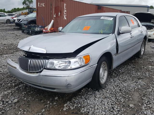 Photo 2 from auction – 2000 LINCOLN TOWN CAR E with VIN 1LNHM81W4YY936561