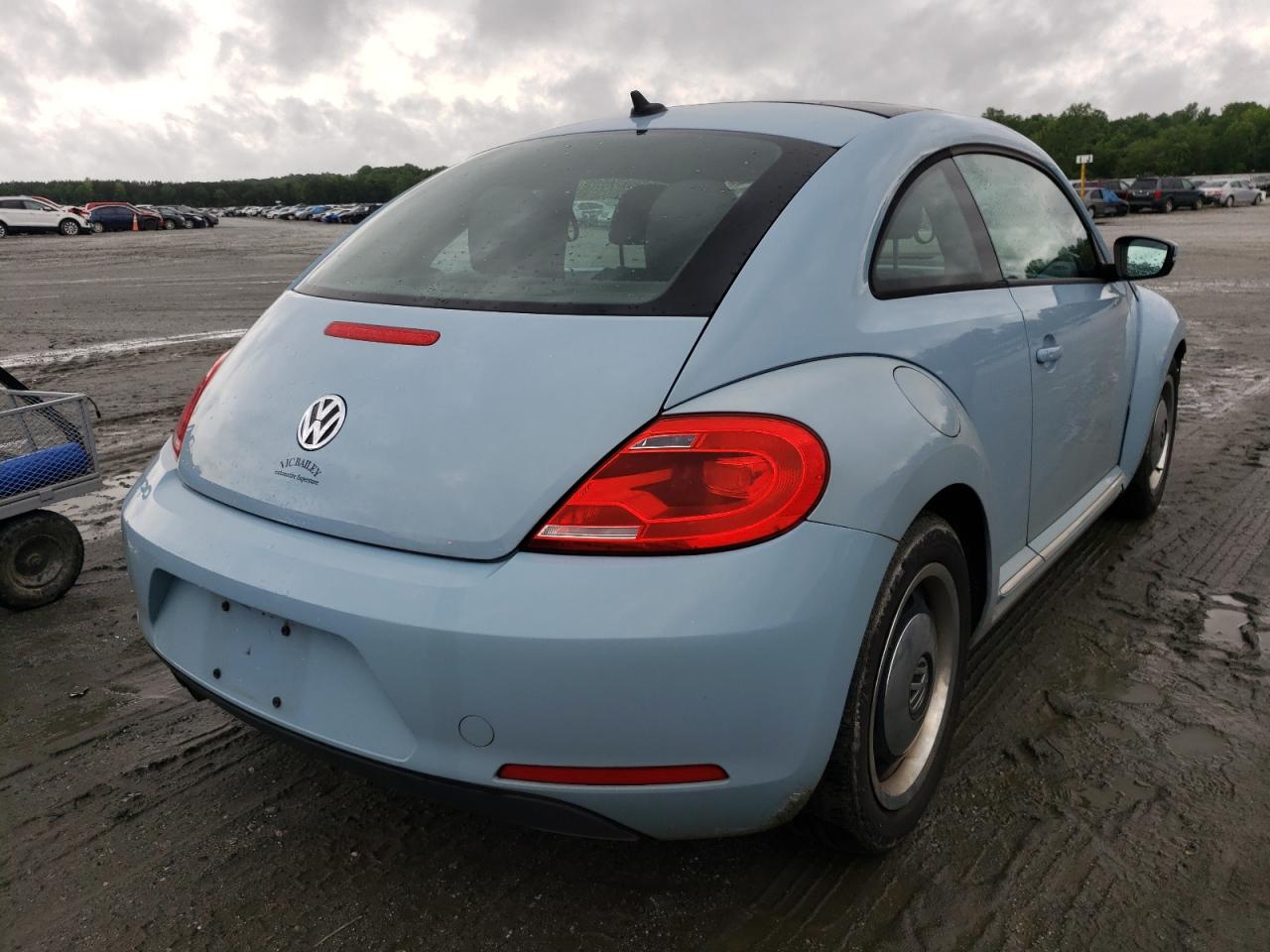 Photo 4 from auction – 2013 VOLKSWAGEN BEETLE with VIN 3VWJX7AT3DM602392
