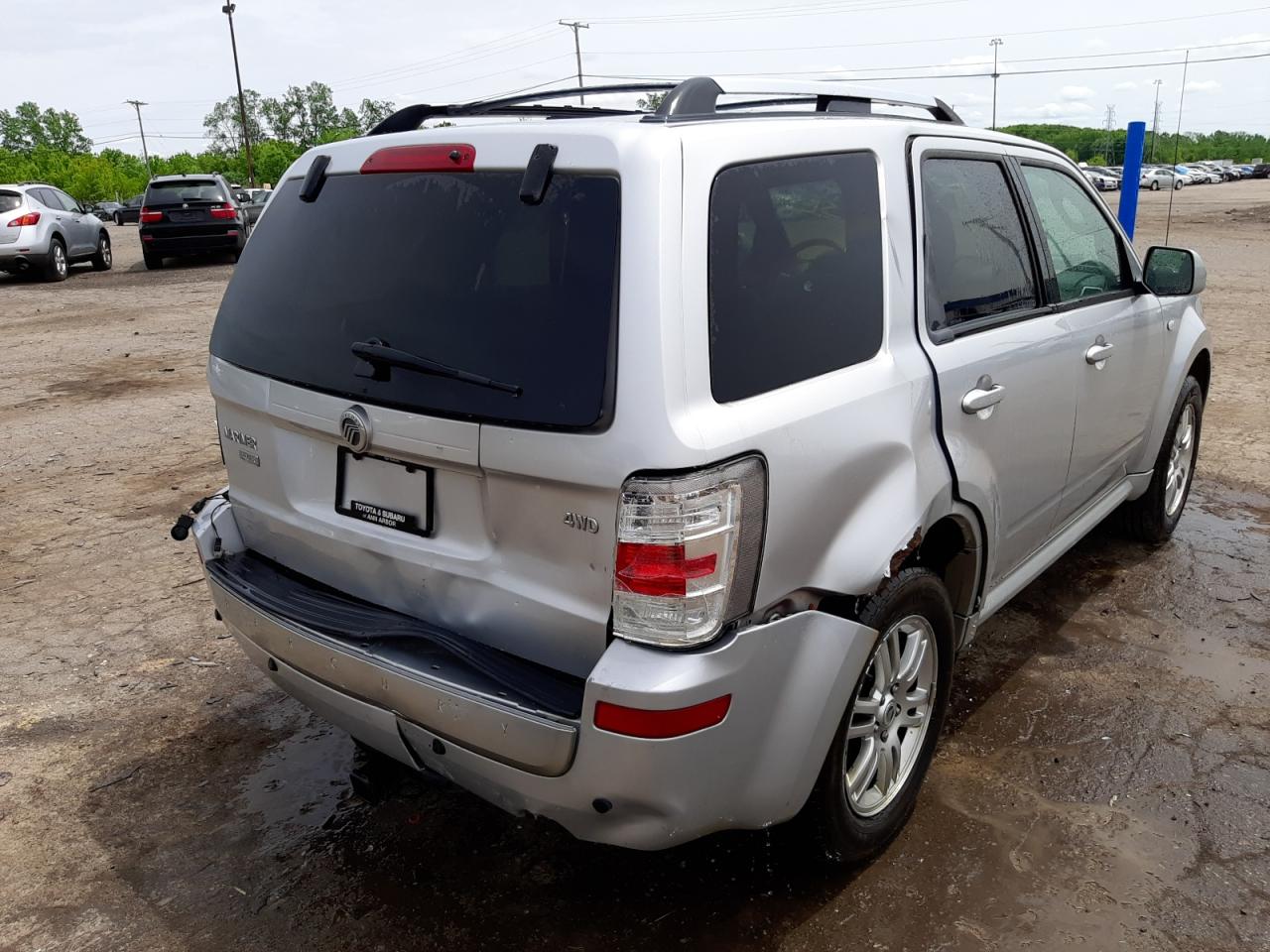 Photo 4 from auction – 2009 MERCURY MARINER PR with VIN 4M2CU97G49KJ07802