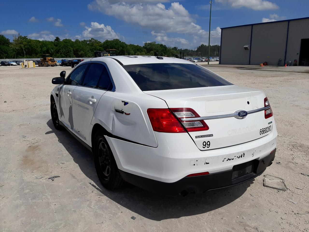 Photo 16 from auction – 2016 FORD TAURUS POL with VIN 1FAHP2MK0GG122371