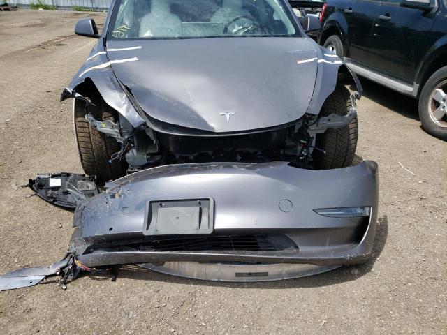 Photo 9 from auction – 2021 TESLA MODEL 3 with VIN 5YJ3E1EC3MF913527