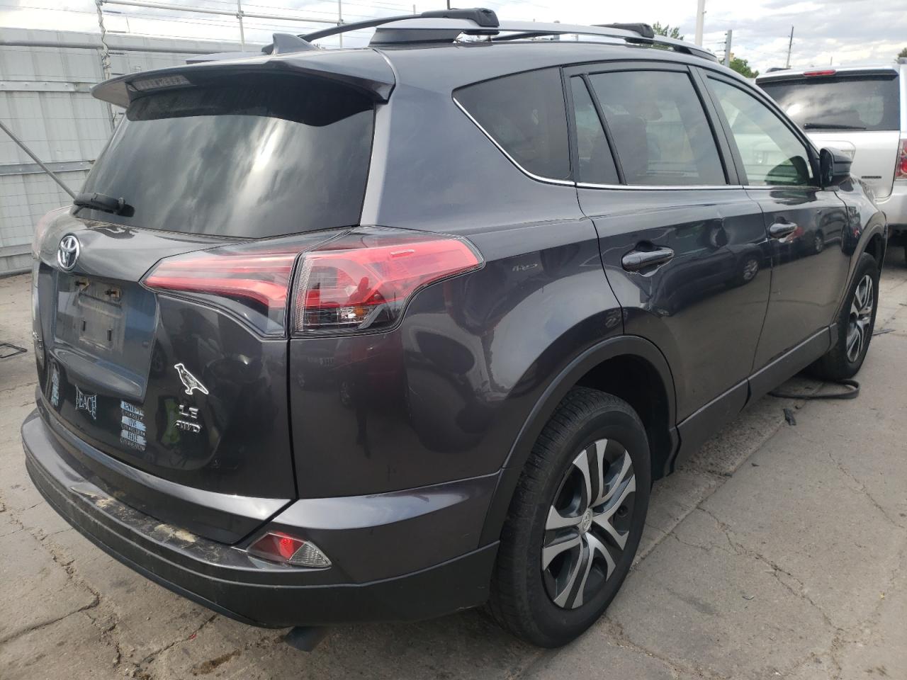 Photo 4 from auction – 2017 TOYOTA RAV4 LE with VIN JTMBFREV2HJ115043