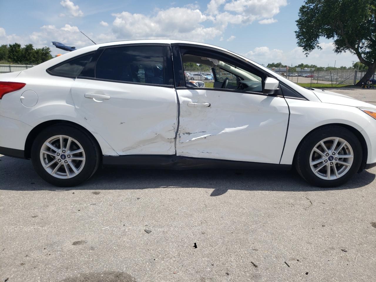 Photo 9 from auction – 2018 FORD FOCUS SE with VIN 1FADP3FE7JL235535