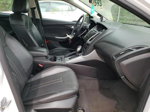Foto 5 de la subasta – 2014 FORD FOCUS SE con VIN 1FADP3F29EL388817