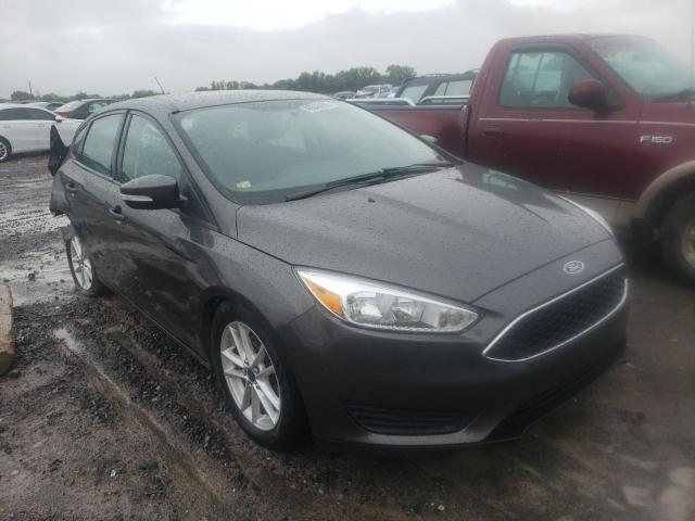 FORD FOCUS SE 2015 with VIN 1FADP3K2XFL297868 - Photo from auction