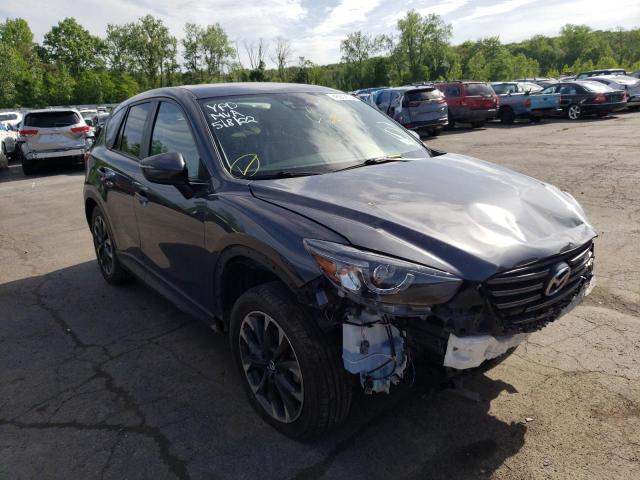 MAZDA CX-5 GT 2016 with VIN JM3KE4DYXG0679746 - Photo from auction