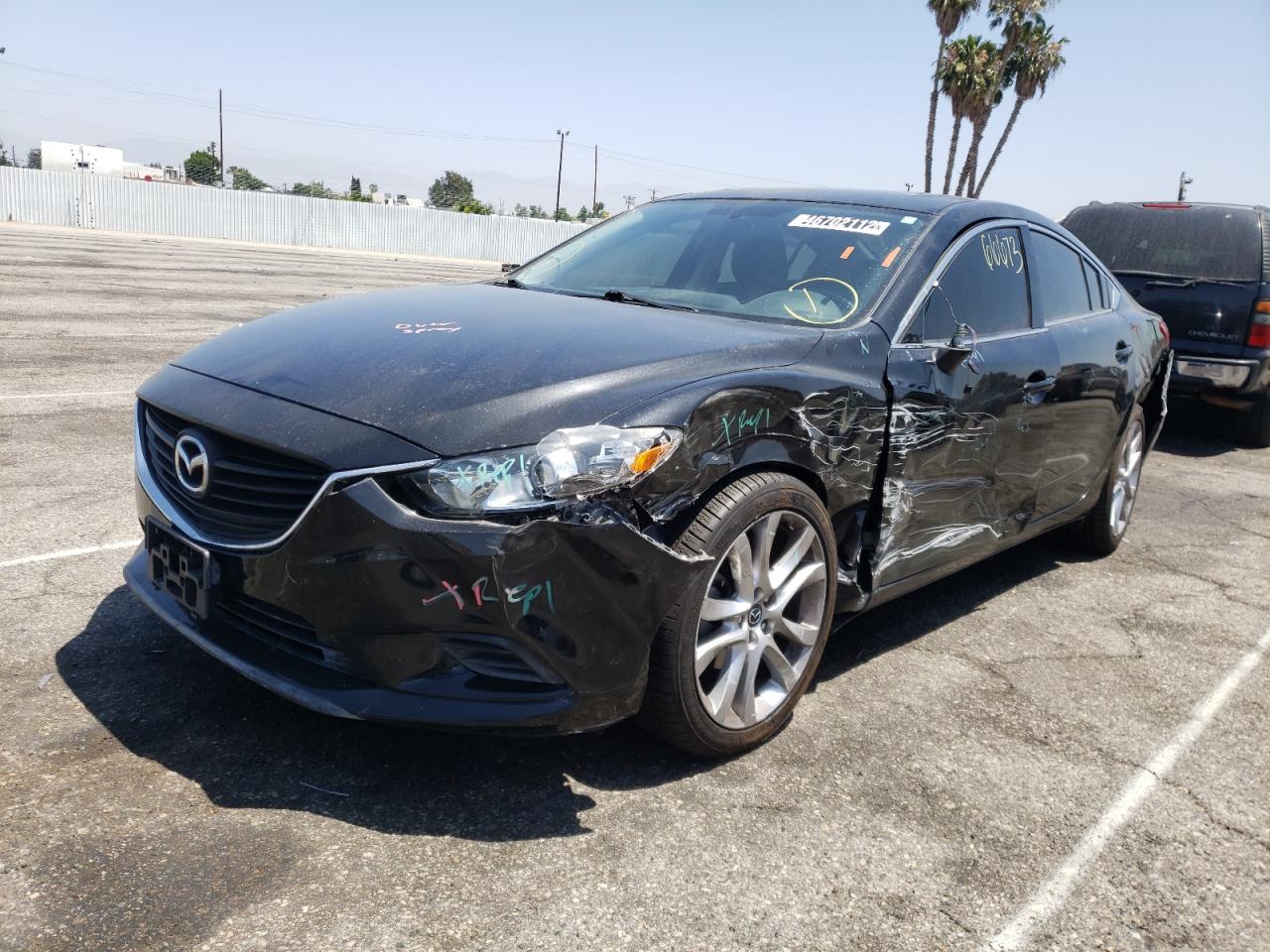 Photo 2 from auction – 2015 MAZDA 6 TOURING with VIN JM1GJ1V51F1218599