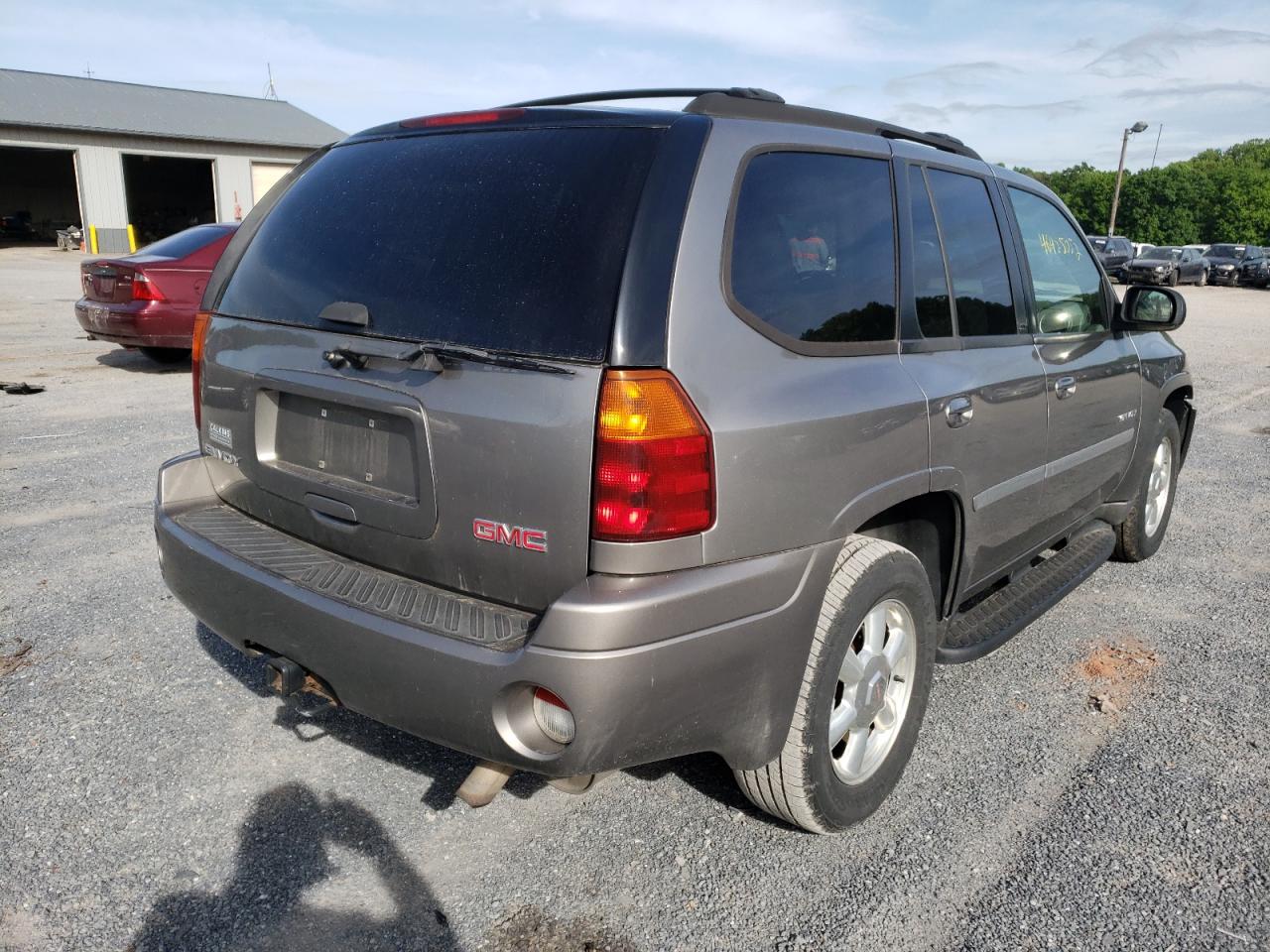 Photo 4 from auction – 2006 GMC ENVOY with VIN 1GKDT13S662138106