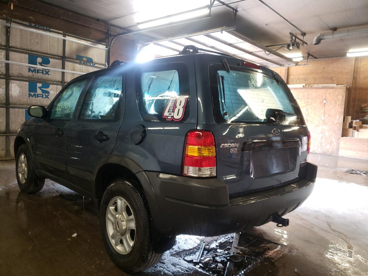 Photo 3 from auction – 2001 FORD ESCAPE XLT with VIN 1FMYU04111KF99034