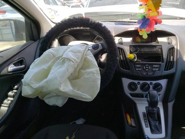 Photo 9 from auction – 2012 FORD FOCUS SE with VIN 1FAHP3F25CL120233
