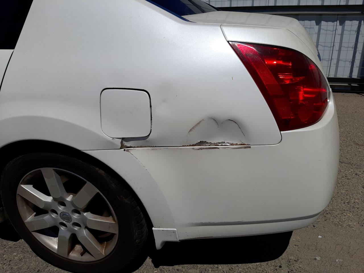 Photo 9 from auction – 2004 NISSAN MAXIMA SE with VIN 1N4BA41E64C825512