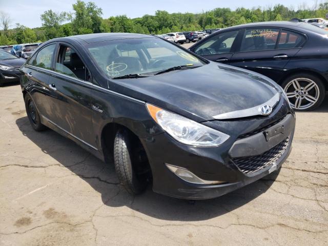 HYUNDAI SONATA HYB 2015 with VIN KMHEC4A41FA128221 - Photo from auction