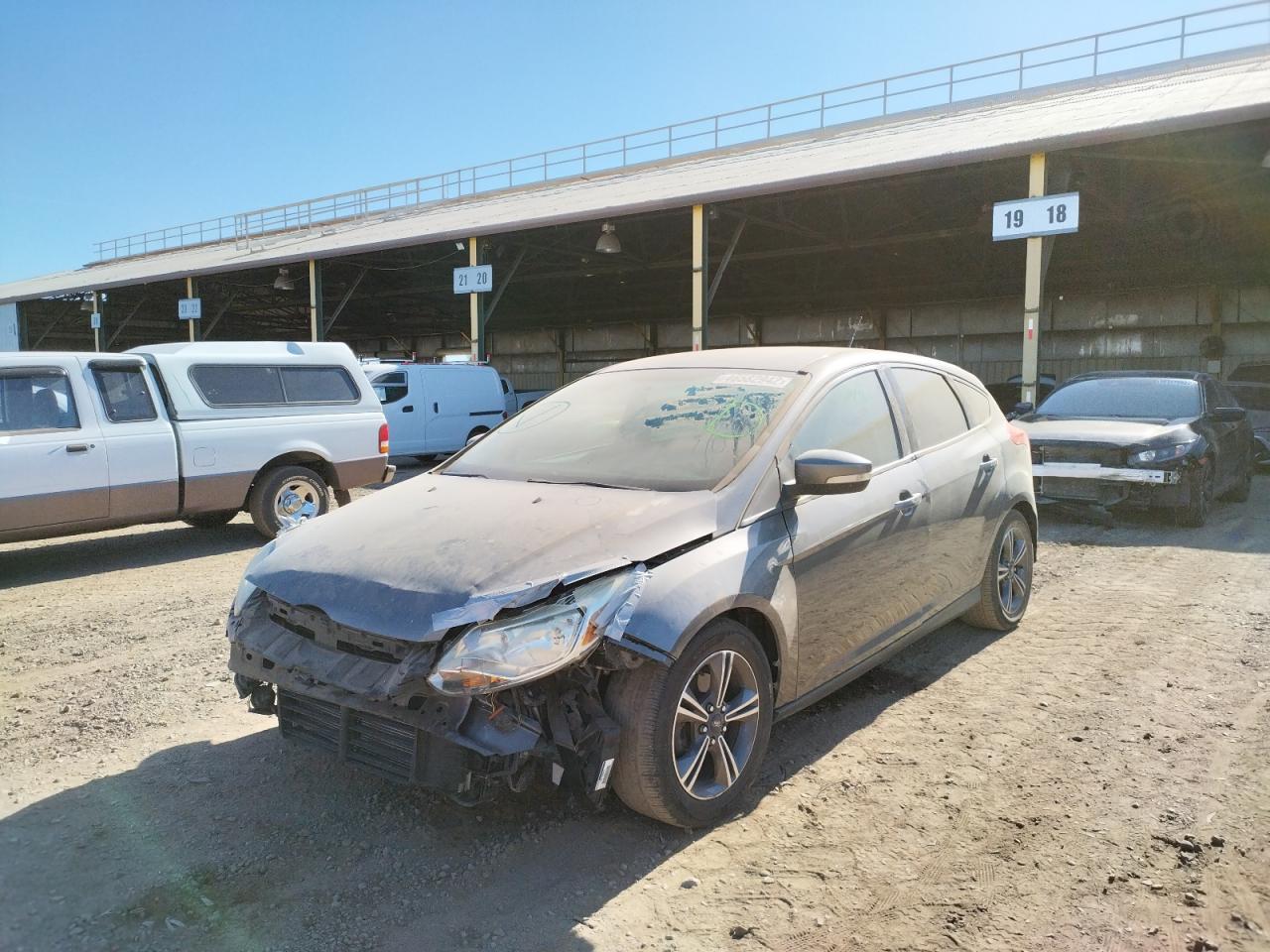 Photo 2 from auction – 2014 FORD FOCUS SE with VIN 1FADP3K29EL169572