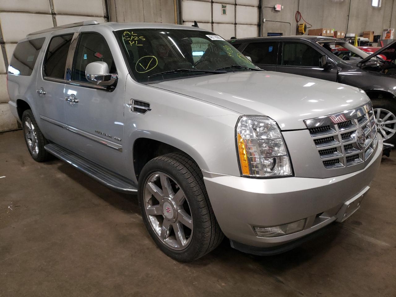 CADILLAC ESCALADE E 2011 with VIN 1GYS4HEF8BR192219 - Photo from auction