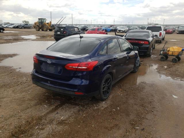 Photo 4 from auction – 2016 FORD FOCUS SE with VIN 1FADP3F21GL385834
