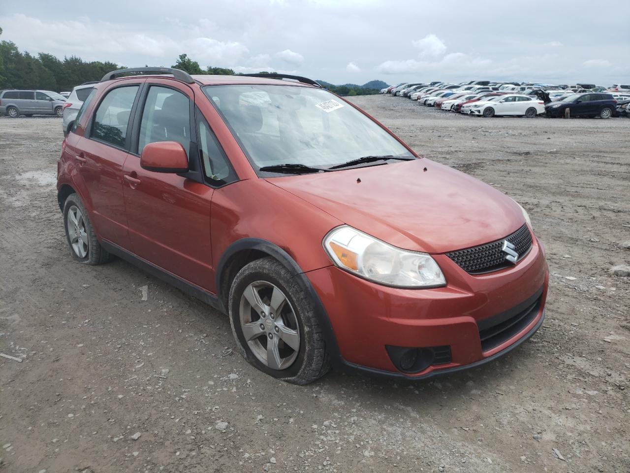 SUZUKI SX4 2012 with VIN JS2YB5A38C6300296 - Photo from auction
