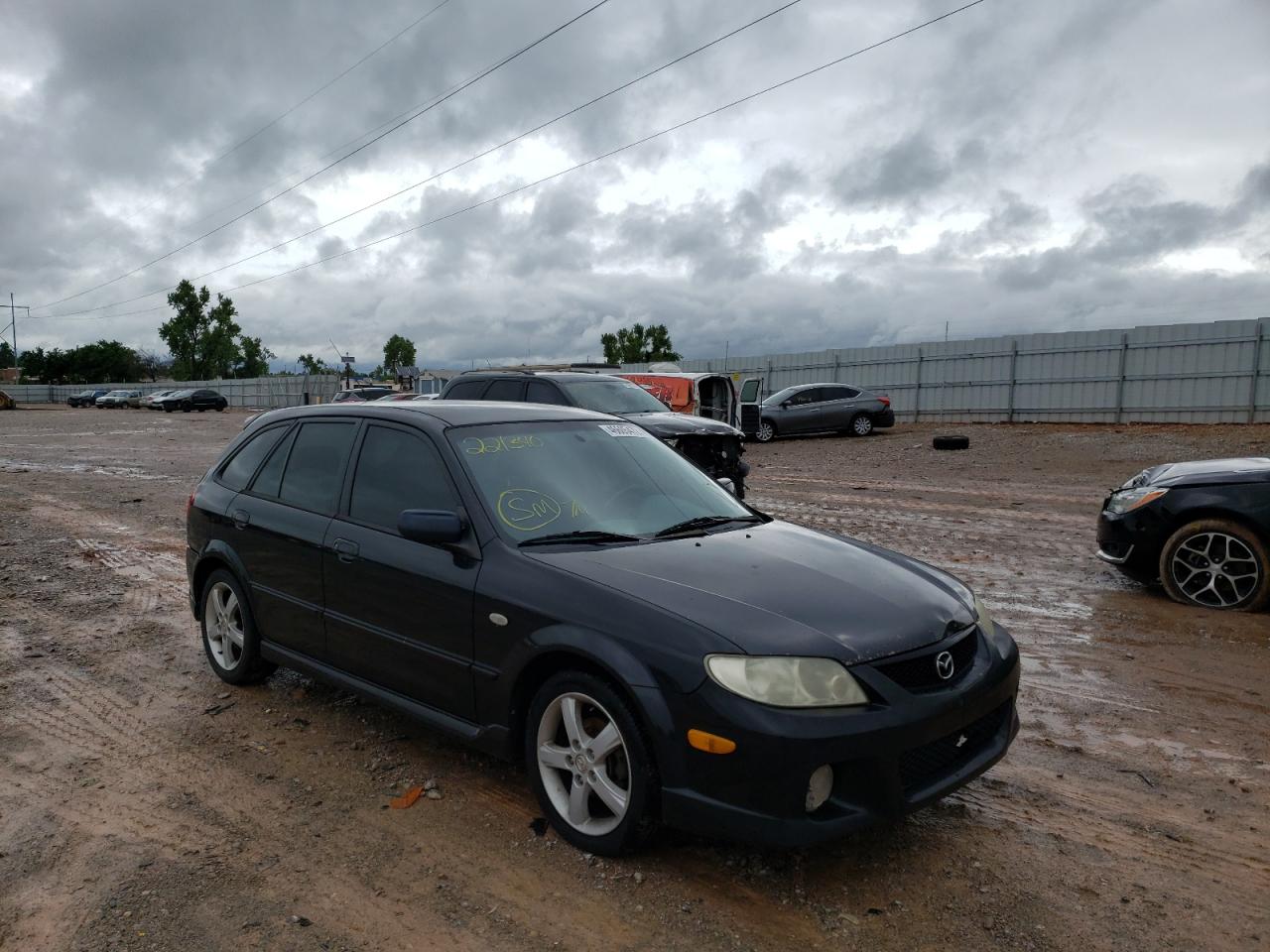 MAZDA PROTEGE PR 2003 with VIN JM1BJ245131221340 - Photo from auction