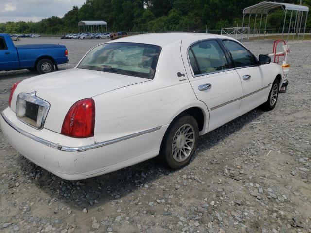 Photo 5 from auction – 2000 LINCOLN TOWN CAR S with VIN 1LNHM82W0YY820644