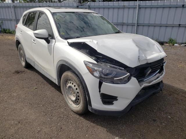 MAZDA CX-5 GT 2016 with VIN JM3KE4DY2G0838761 - Photo from auction
