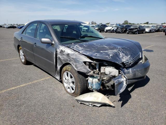 TOYOTA CAMRY LE 2005 with VIN JTDBE30K953031458 - Photo from auction
