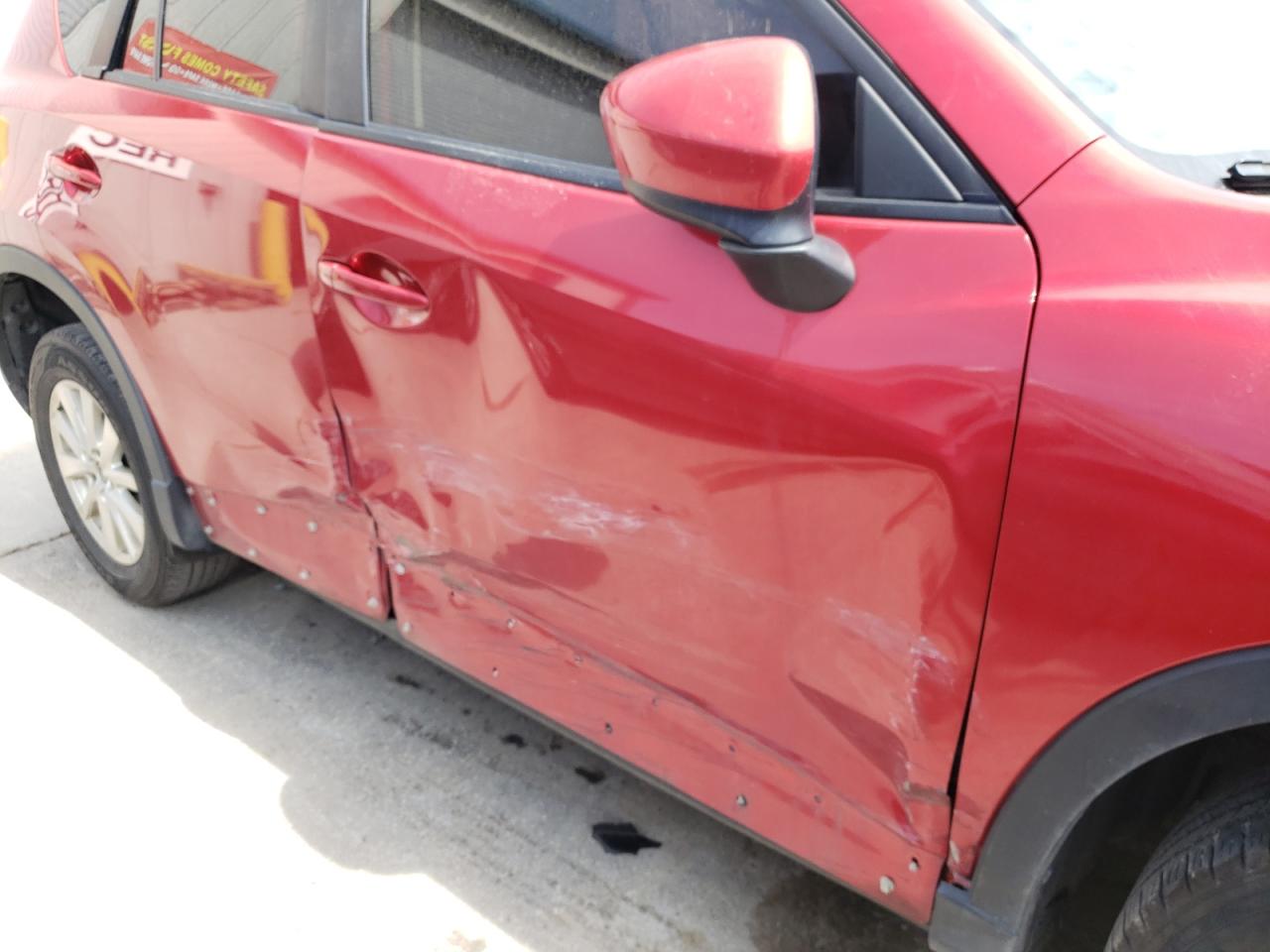 Photo 20 from auction – 2014 MAZDA CX-5 SPORT with VIN JM3KE2BE3E0341258