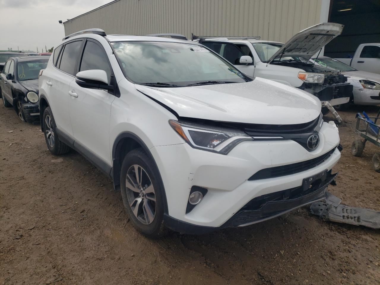 TOYOTA RAV4 XLE 2017 with VIN JTMWFREV2HD097885 - Photo from auction