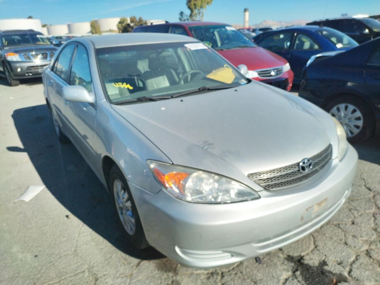 TOYOTA CAMRY LE 2004 with VIN 4T1BF32K14U068633 - Photo from auction