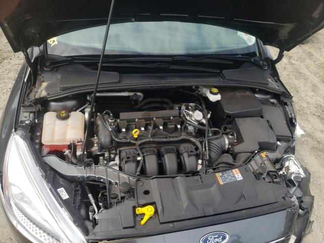 Foto 7 de la subasta – 2018 FORD FOCUS SE con VIN 1FADP3F28JL318932