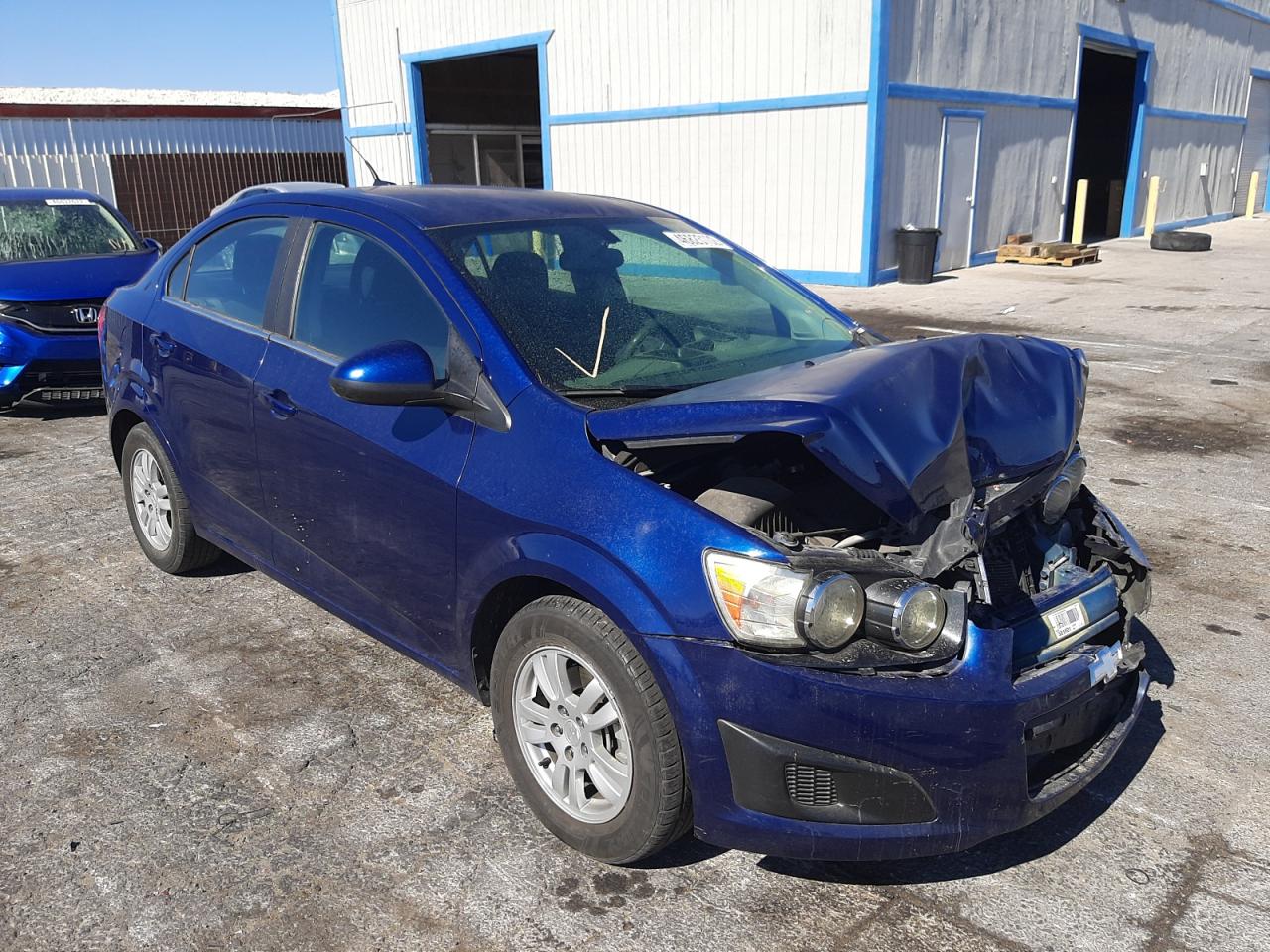 CHEVROLET SONIC LT 2014 with VIN 1G1JC5SH4E4187893 - Photo from auction