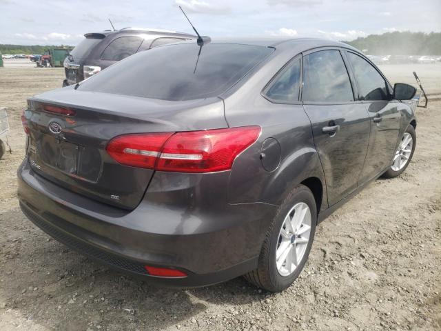 Foto 4 de la subasta – 2018 FORD FOCUS SE con VIN 1FADP3F28JL318932