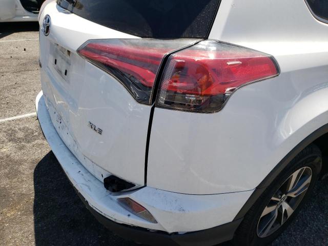 Photo 9 from auction – 2017 TOYOTA RAV4 XLE with VIN JTMWFREV9HJ720307