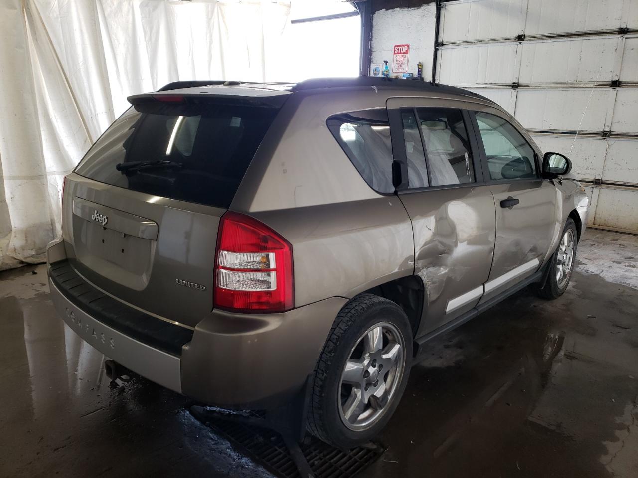 Photo 4 from auction – 2007 JEEP COMPASS LI with VIN 1J8FT57W87D176511