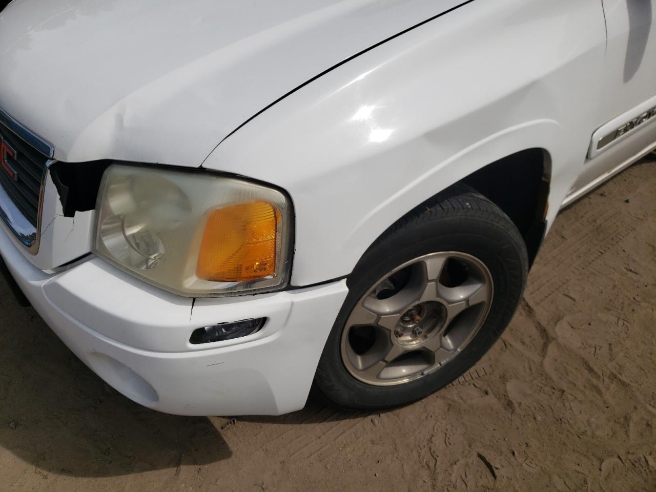 Photo 9 from auction – 2004 GMC ENVOY with VIN 1GKDT13S642422820