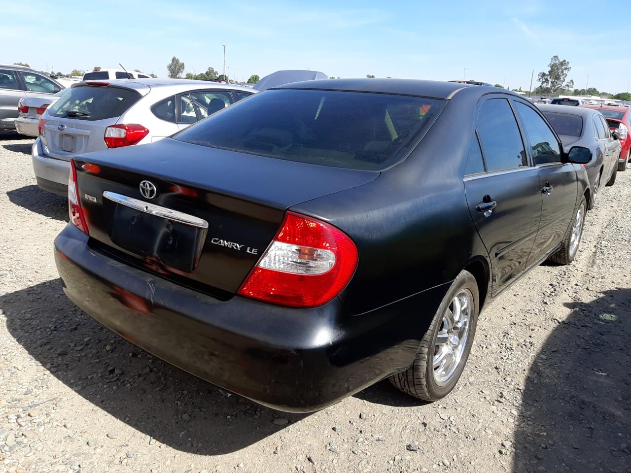 Photo 4 from auction – 2002 TOYOTA CAMRY LE with VIN JTDBE32KX20039059