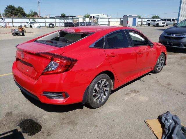 Photo 4 from auction – 2018 HONDA CIVIC EX with VIN 2HGFC2F70JH604390