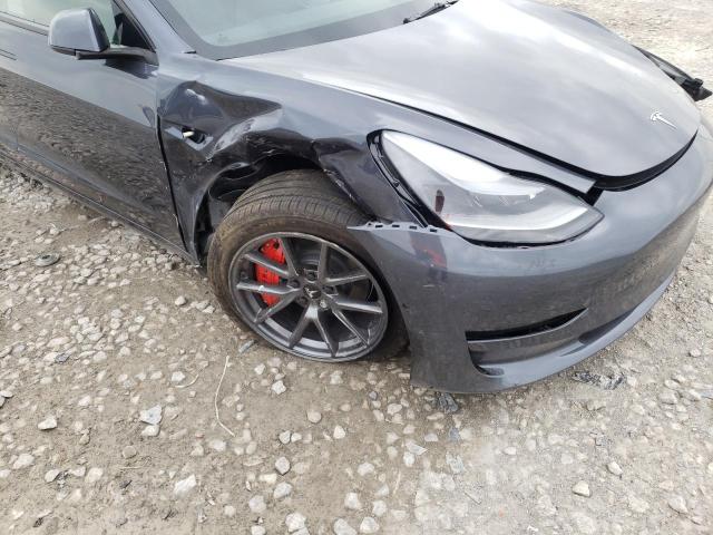 Photo 9 from auction – 2022 TESLA MODEL 3 with VIN 5YJ3E1EB1NF175560
