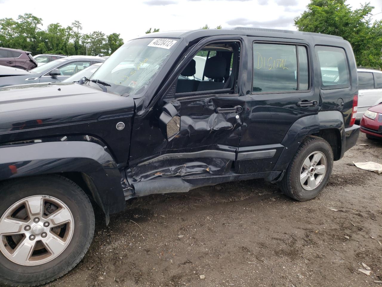 Photo 19 from auction – 2012 JEEP LIBERTY SP with VIN 1C4PJMAKXCW115273