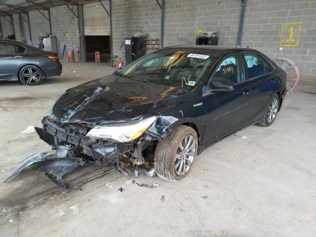 Photo 2 from auction – 2015 TOYOTA CAMRY HYBR with VIN 4T1BD1FK2FU148272