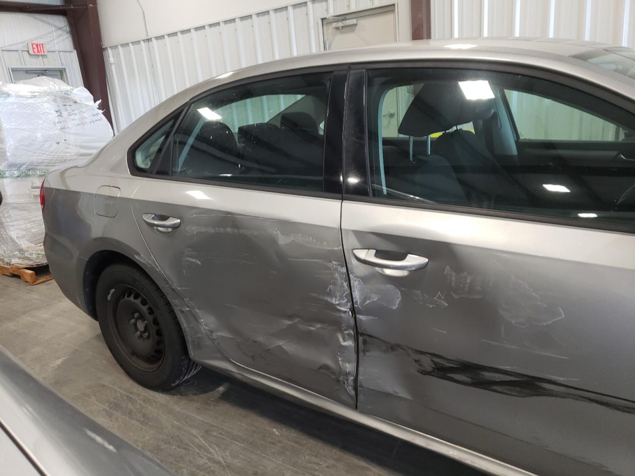 Photo 20 from auction – 2013 VOLKSWAGEN PASSAT S with VIN 1VWAP7A34DC080700