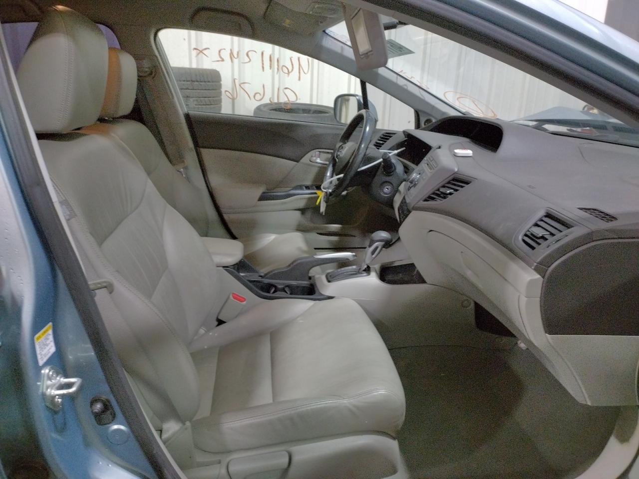 Photo 19 from auction – 2012 HONDA CIVIC HYBR with VIN JHMFB4F35CS007689