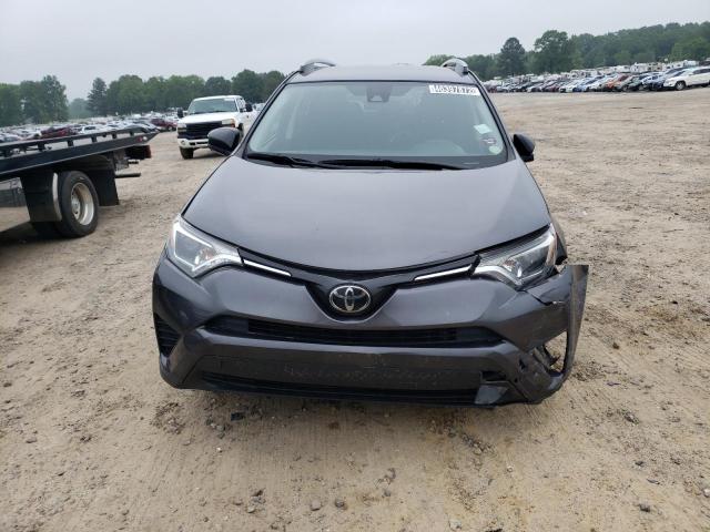 Photo 7 from auction – 2018 TOYOTA RAV4 LE with VIN JTMZFREV4JJ745652