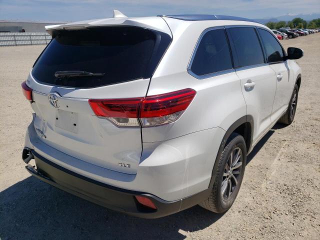 Photo 4 from auction – 2018 TOYOTA HIGHLANDER with VIN 5TDKZRFH1JS279960