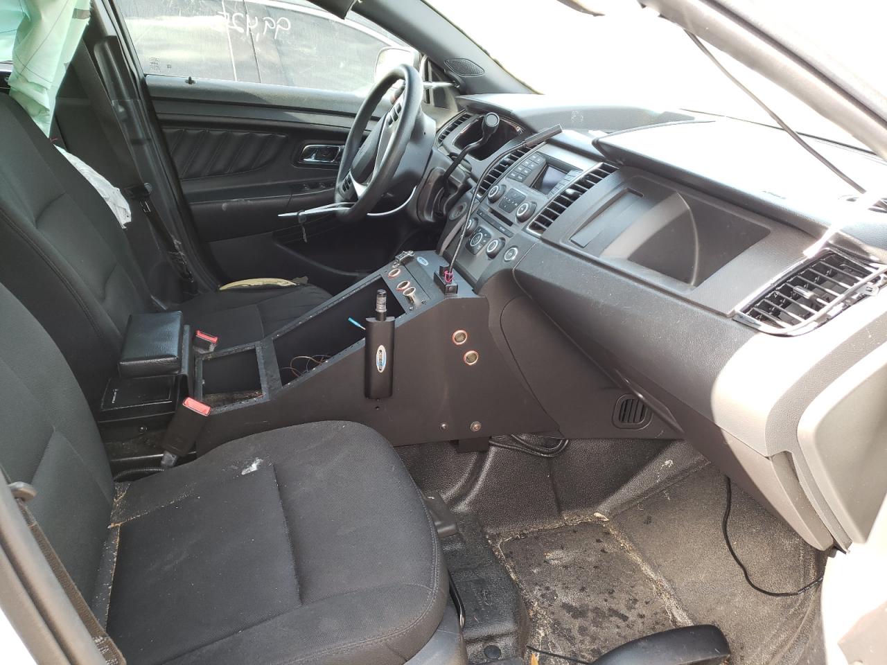 Photo 19 from auction – 2016 FORD TAURUS POL with VIN 1FAHP2MK0GG122371