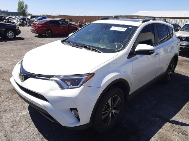 Photo 2 from auction – 2017 TOYOTA RAV4 XLE with VIN JTMWFREV2HD100588