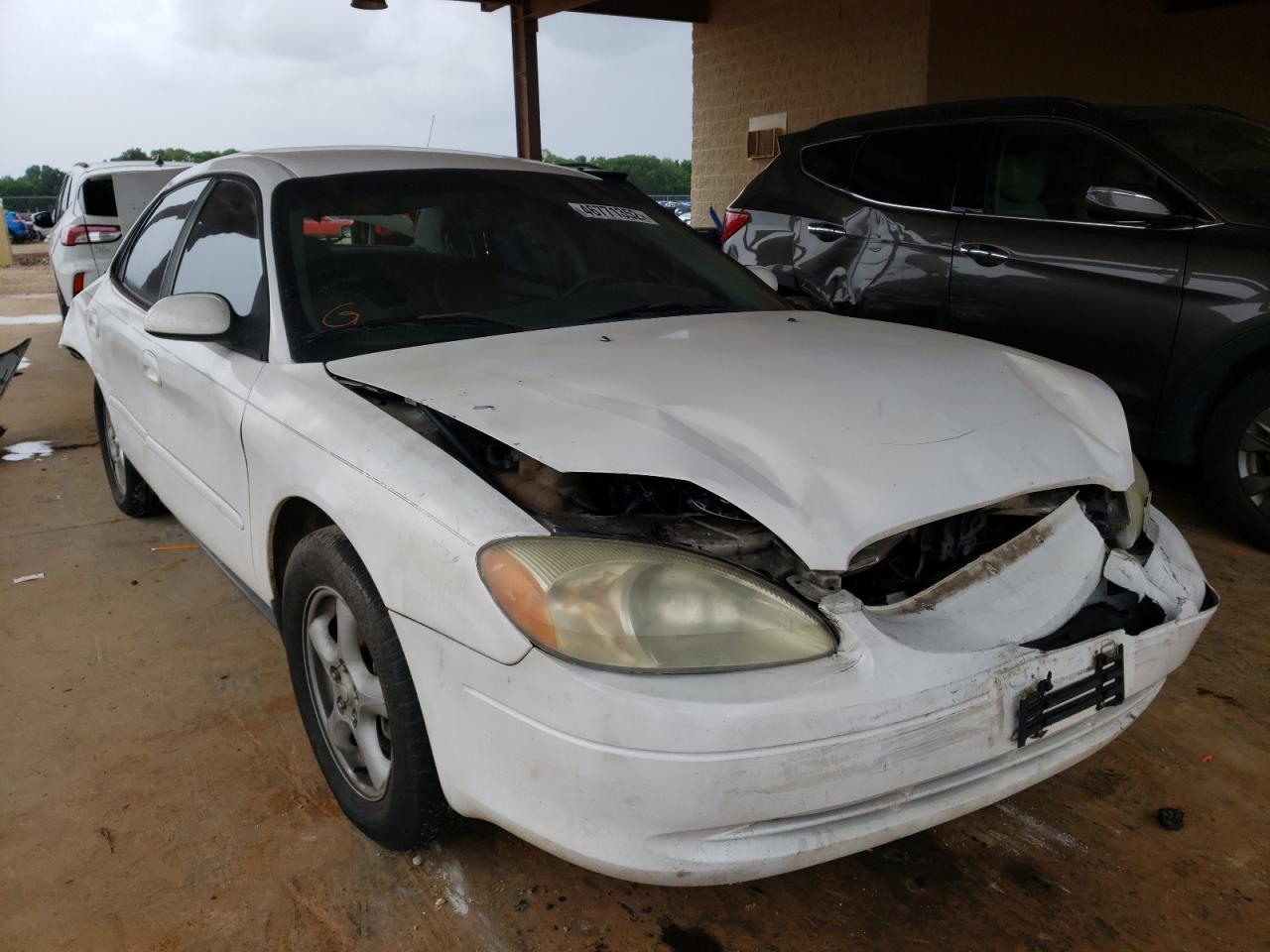 FORD TAURUS SES 2003 with VIN 1FAFP55U93G276631 - Photo from auction
