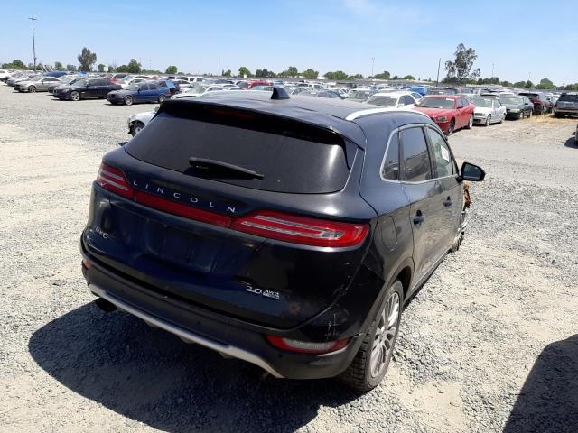Photo 4 from auction – 2015 LINCOLN MKC with VIN 5LMCJ2A95FUJ04688