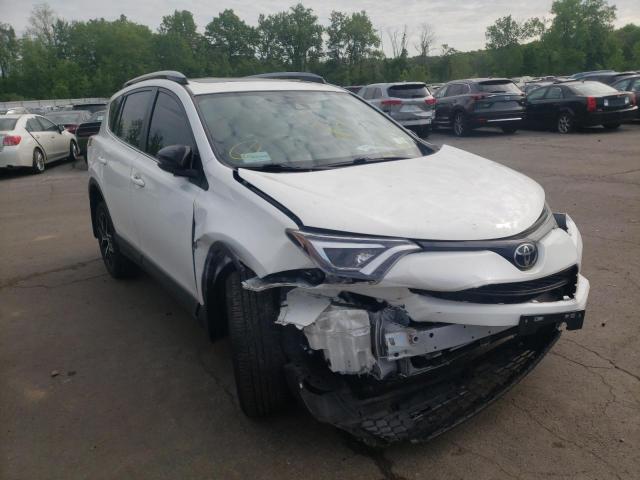 TOYOTA RAV4 SE 2018 with VIN JTMJFREV4JJ740285 - Photo from auction