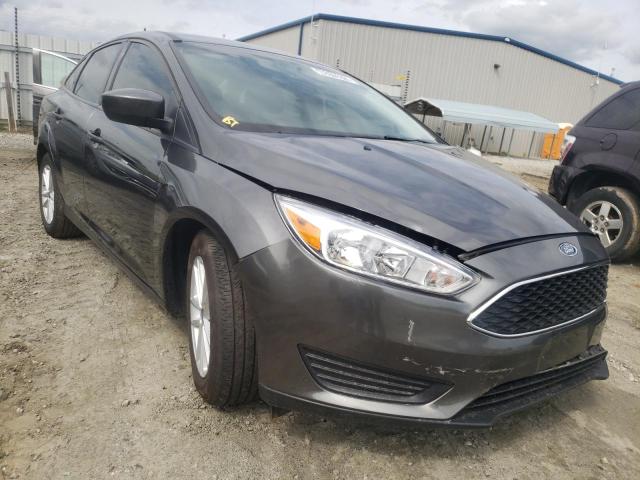 FORD FOCUS SE 2018 with VIN 1FADP3F28JL318932 - Photo from auction