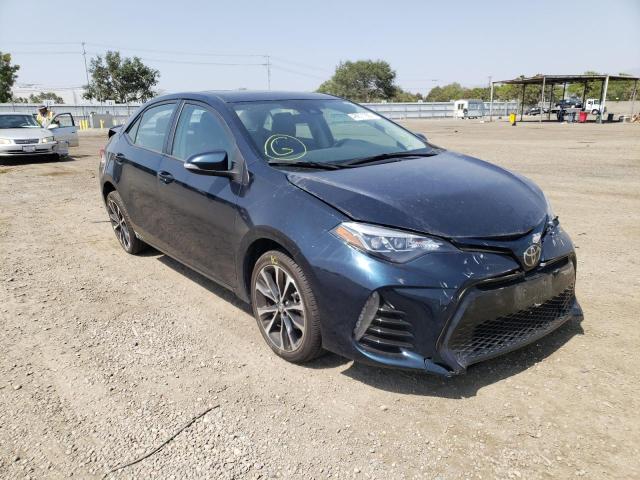TOYOTA COROLLA L 2019 with VIN 2T1BURHE3KC137301 - Photo from auction
